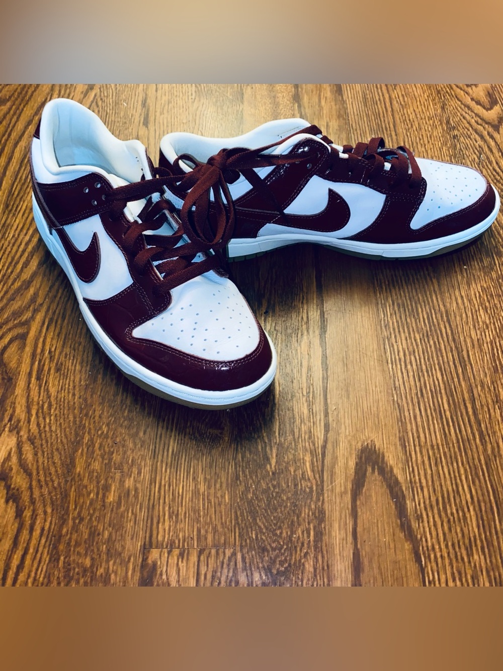 Nike size 10.5 Men’s Low-Top Sneakers - White & textured Burgundy/Maroon shiny